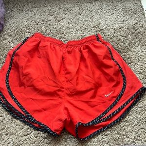 Red and black Nike shorts